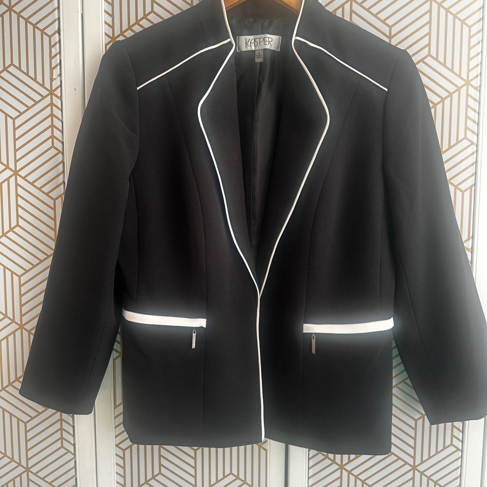 Black blazer with some white piping trim.  KASPER size 8.